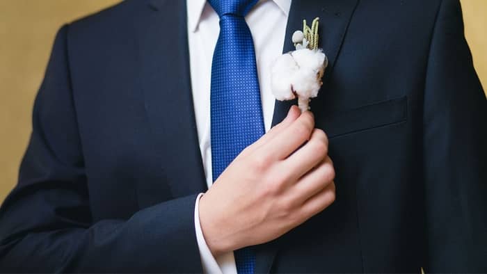  how to pin a boutonniere